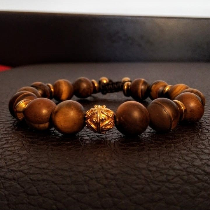 Gold sphere & tiger's eye coffe