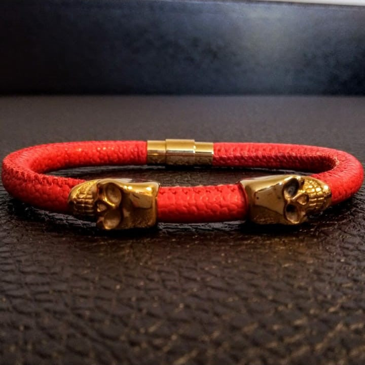 Golden skull with red stingray skin