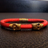 Golden skull with red stingray skin